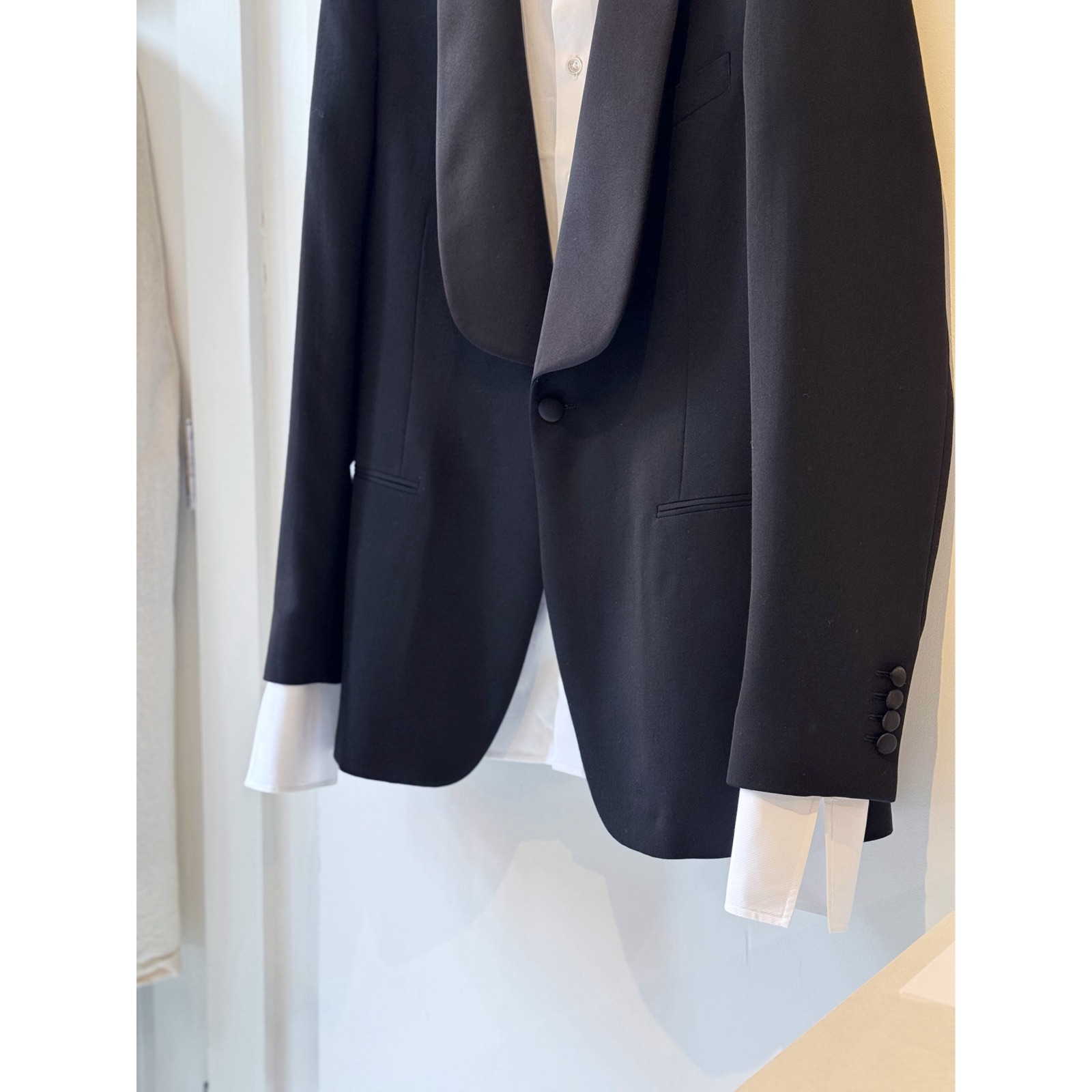 Black tuxedo jacket and white shirt tailored by FEN (Siân Jones).