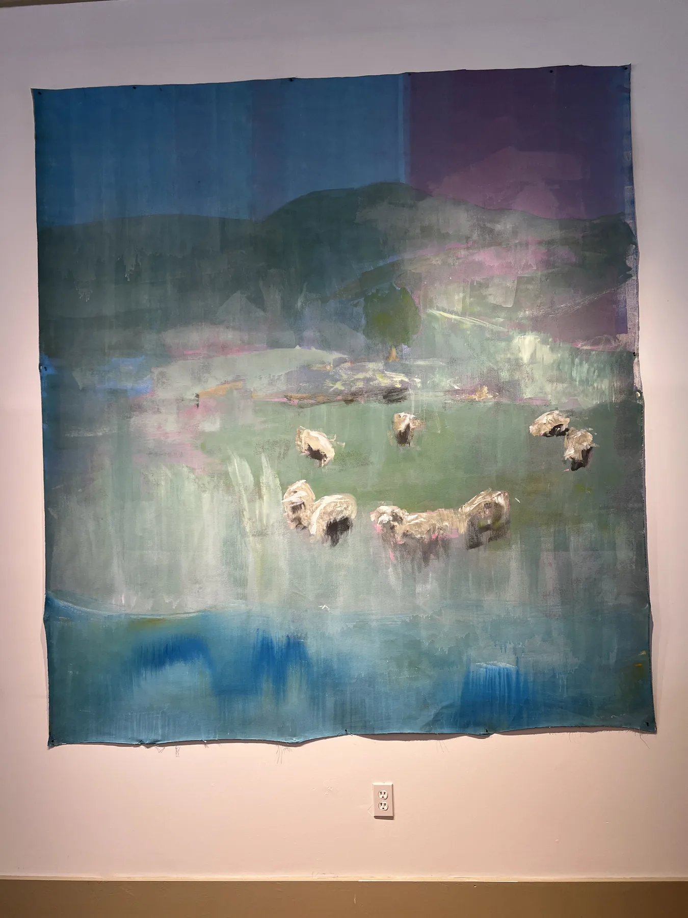 Misty Meadow textile artwork by Carlo Mongiardo installed on a gallery wall.