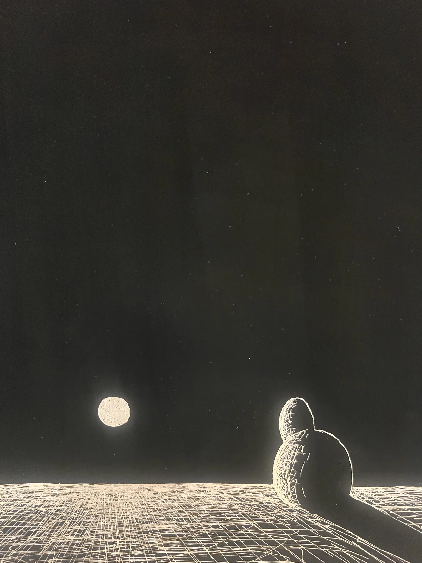 Monochrome artwork showing two figures beneath a bright moon.
